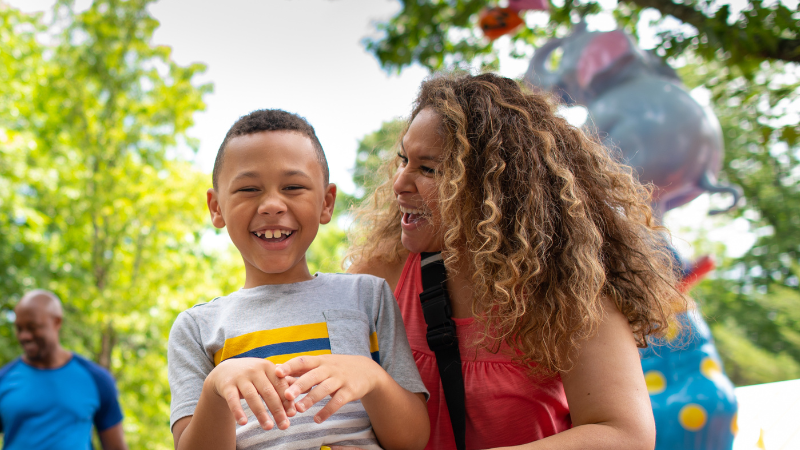 Mother and son smiling