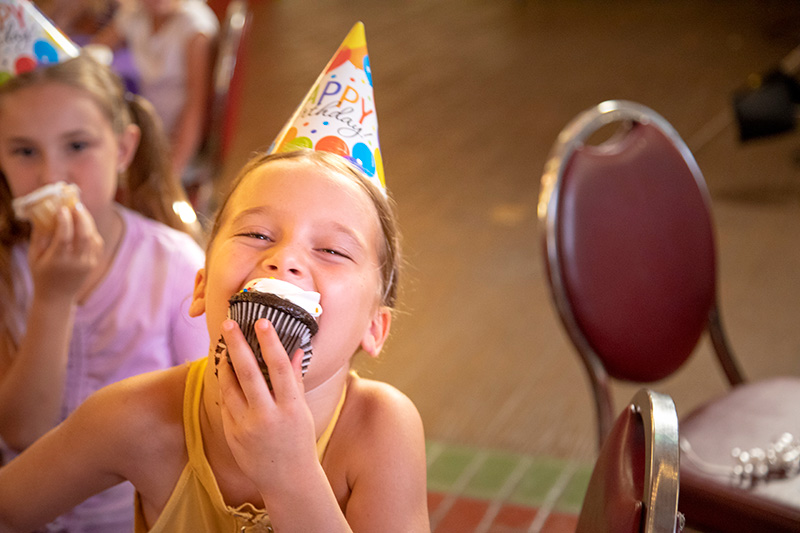 Child eating a cupcake