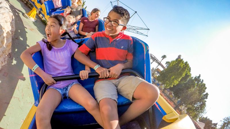 Riders enjoying Merlin coaster 
