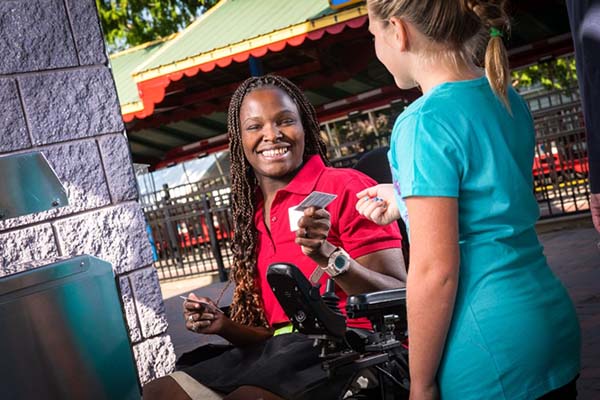 Castle Park employee greeting customer