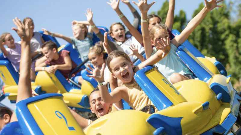 CTP Kids riding Merlin's Revenge, a thrill coaster at Castle Park