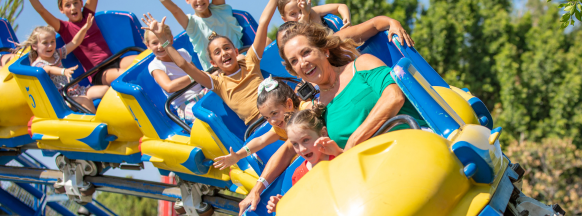 Family of Two Smiling on Rollercoaster