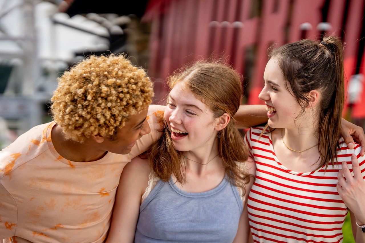 three teens hanging out at Castle Park