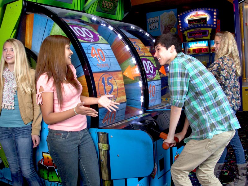 Teens playing in Arcade