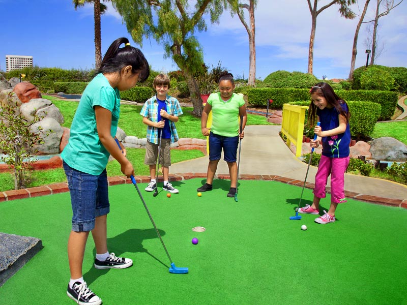 Children playing mini golf!